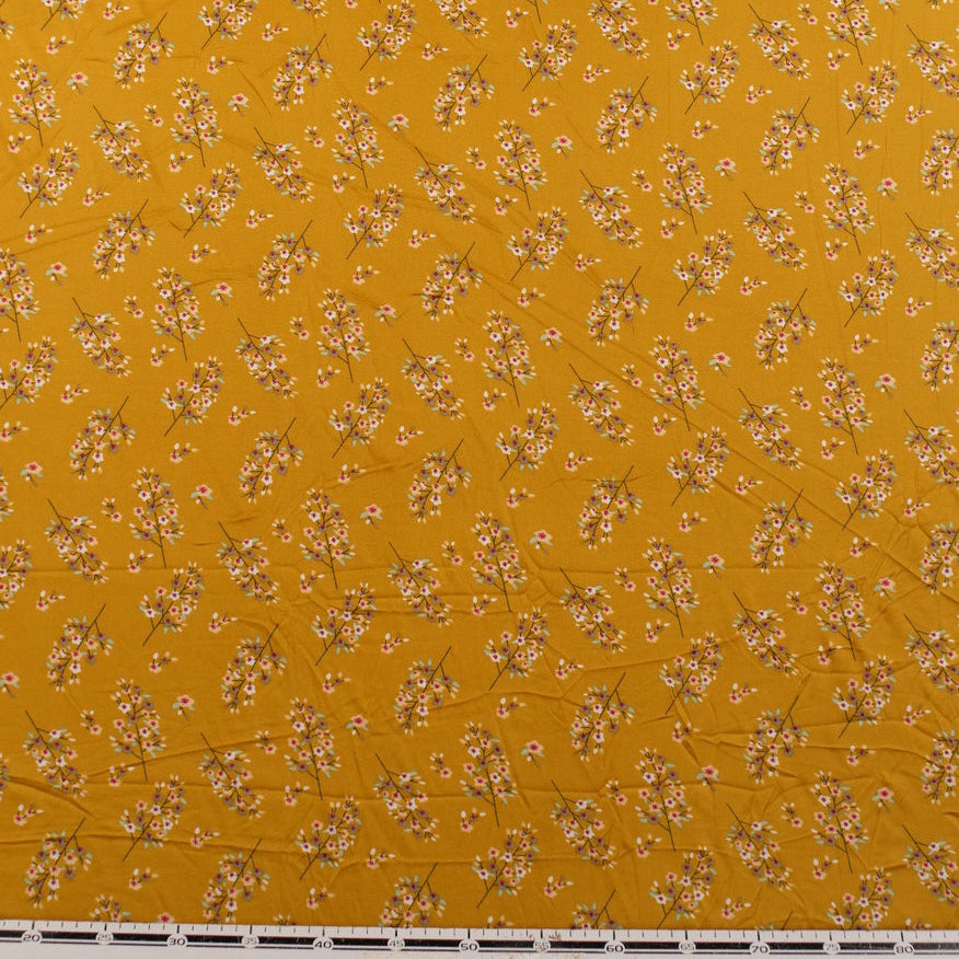 PIEL DE DURAZNO ESTAMPADO AMARILLO MINERAL