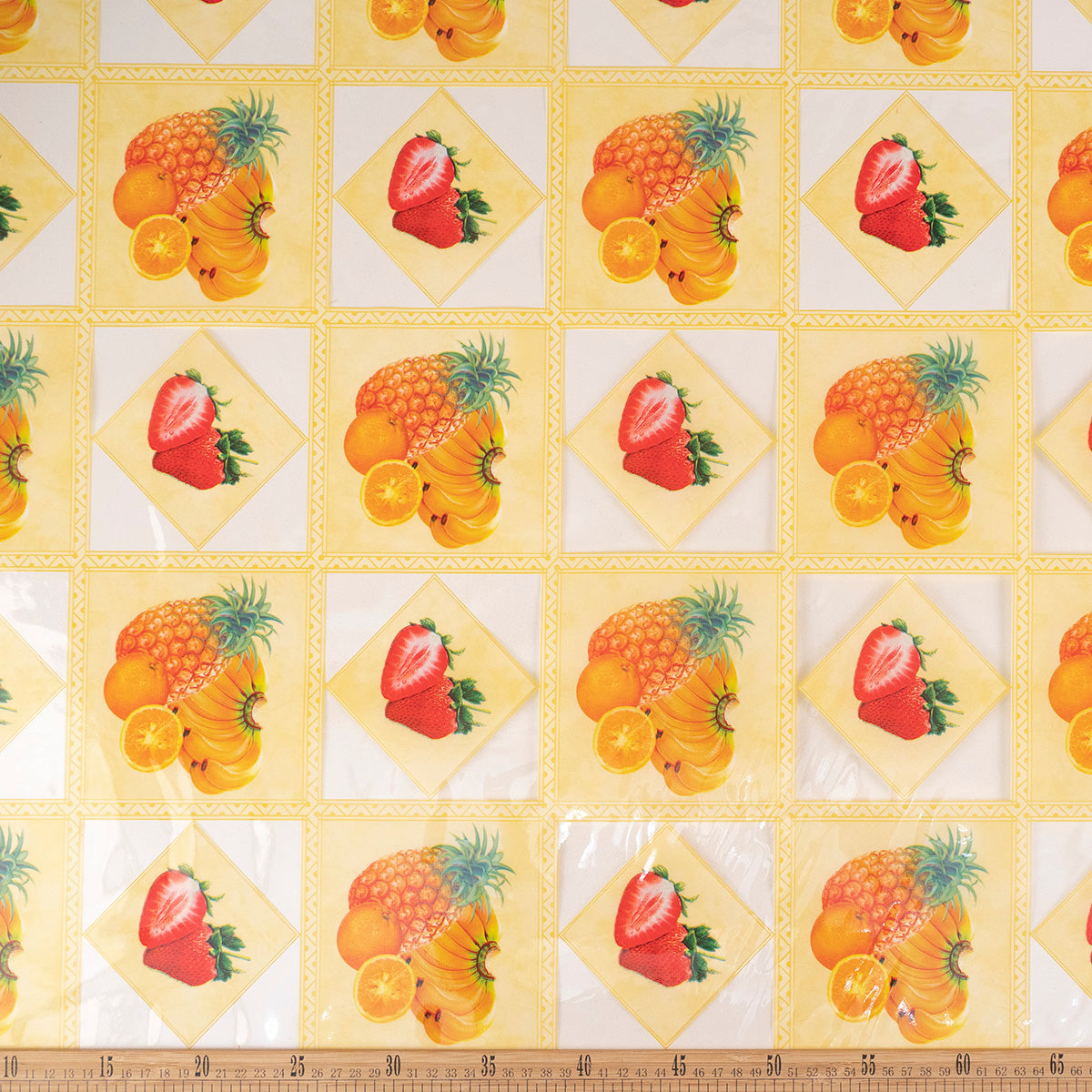 PVC ESTAMPADO AMARILLO CERA CON FRUTAS
