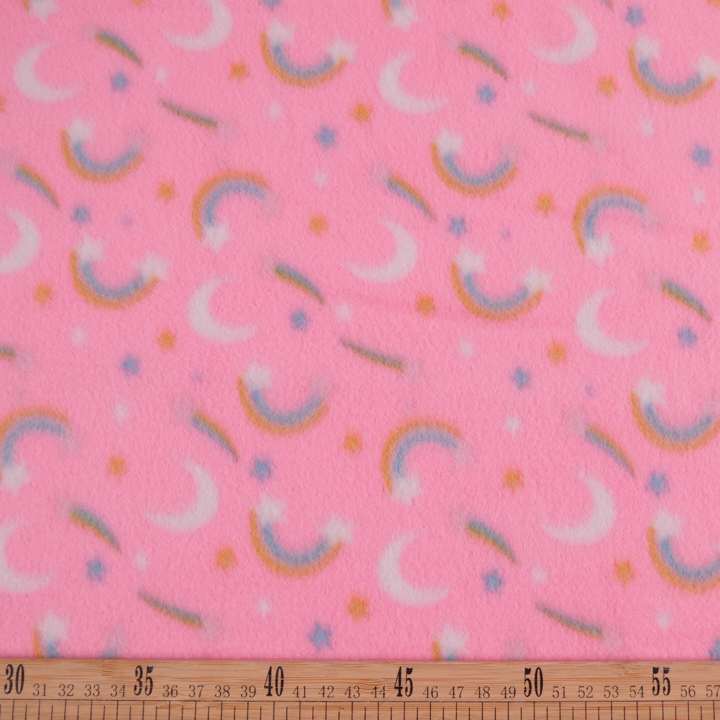 POLAR INFANTIL ROSA AURORA LUNAS, ESTRELLAS Y ARCO IRIS