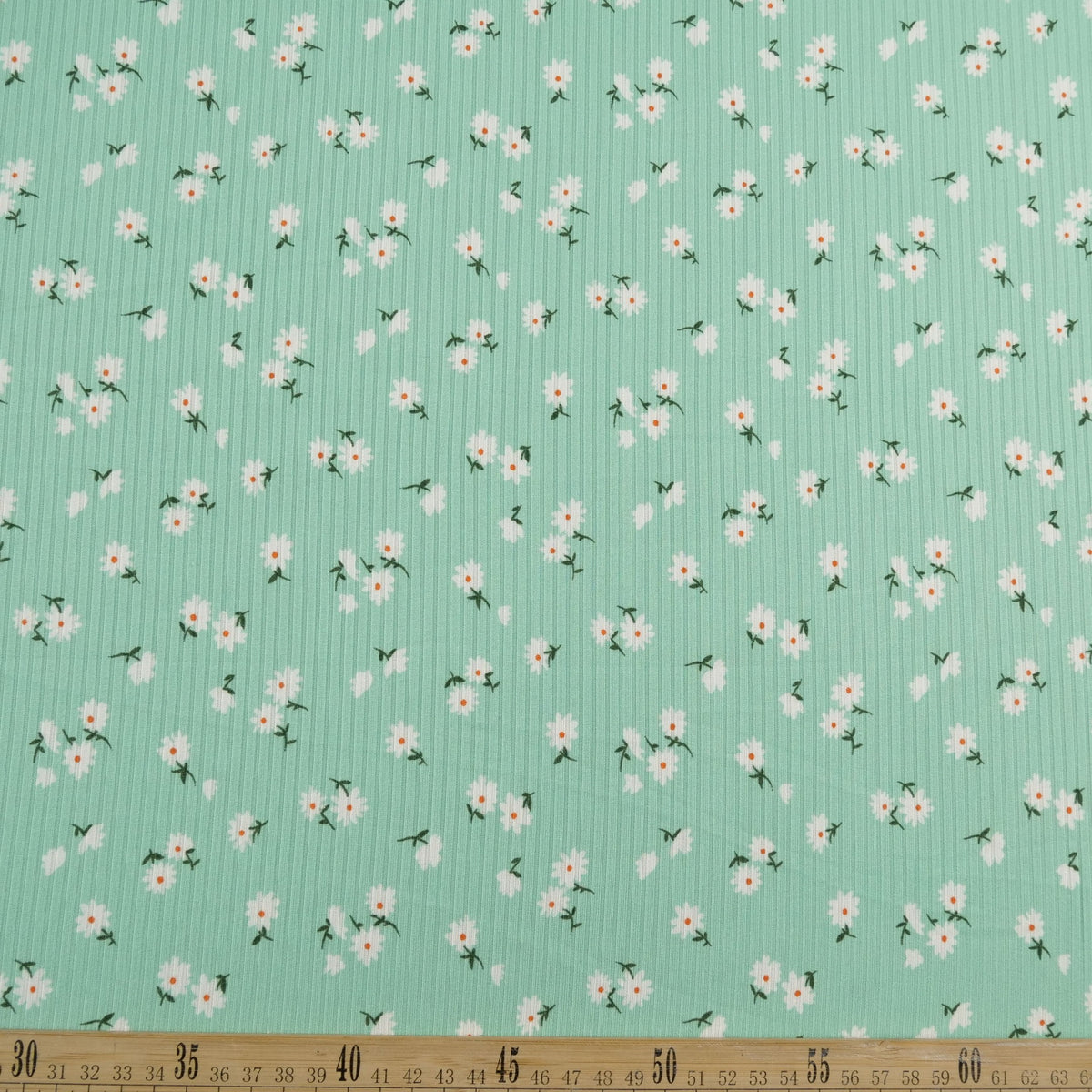 MORLEY ESTAMPADO VERDE AGUA NEPTUNO CON MARGARITAS PEQUEÑAS