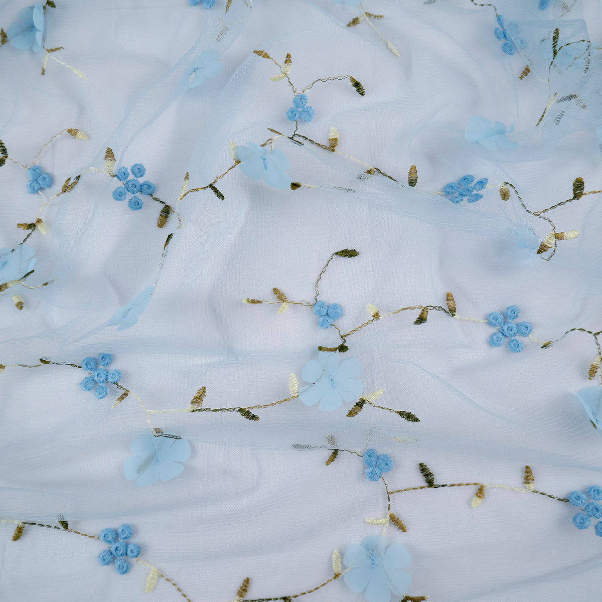 TUL LOLA CELESTE RAMAS CON FLORES