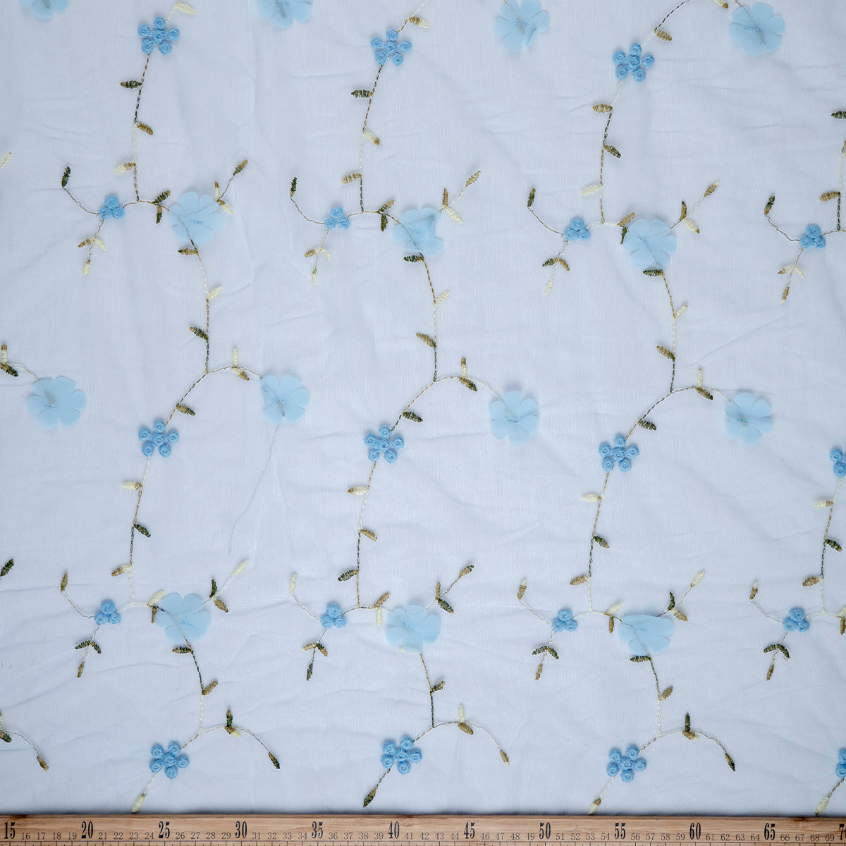 TUL LOLA CELESTE RAMAS CON FLORES