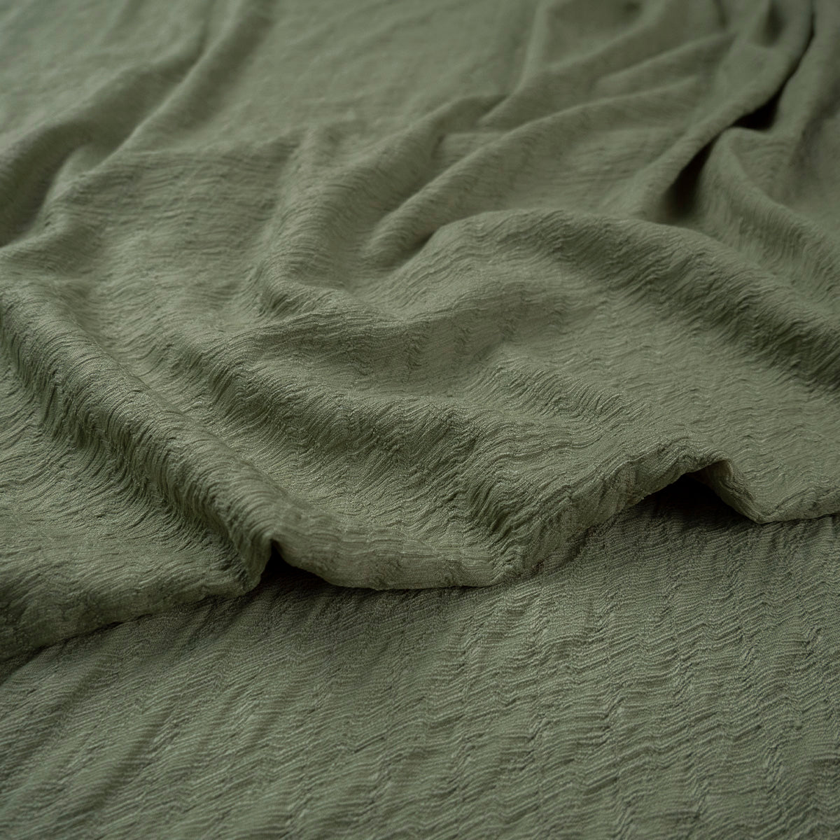 CREPE DRAPE MOIRE VERDE MUERDAGO