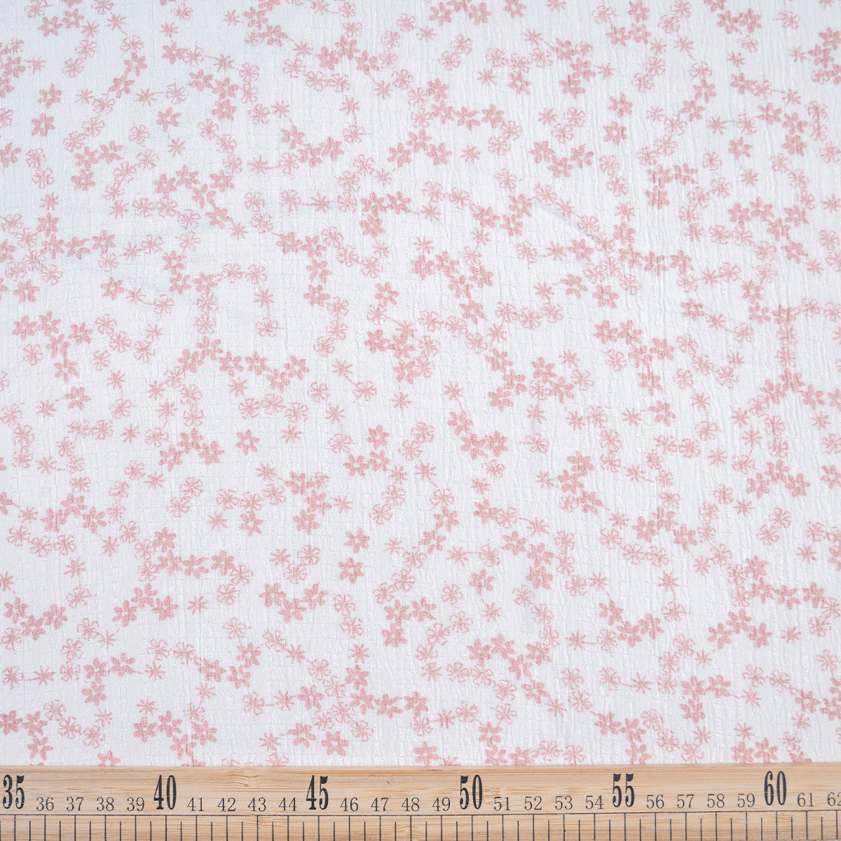 CREPE MARINA ESTAMPADO BLANCO NIEVE PEQUEÑAS FLORES ROSAS