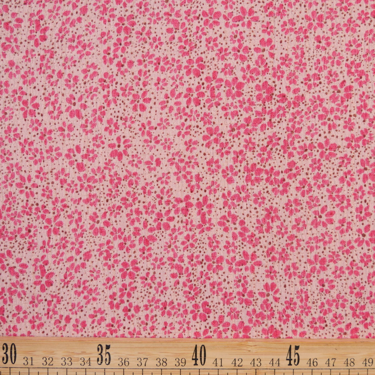 CREPE MARINA ESTAMPADO ROSA CREMA TAN FLORES FUCSIA