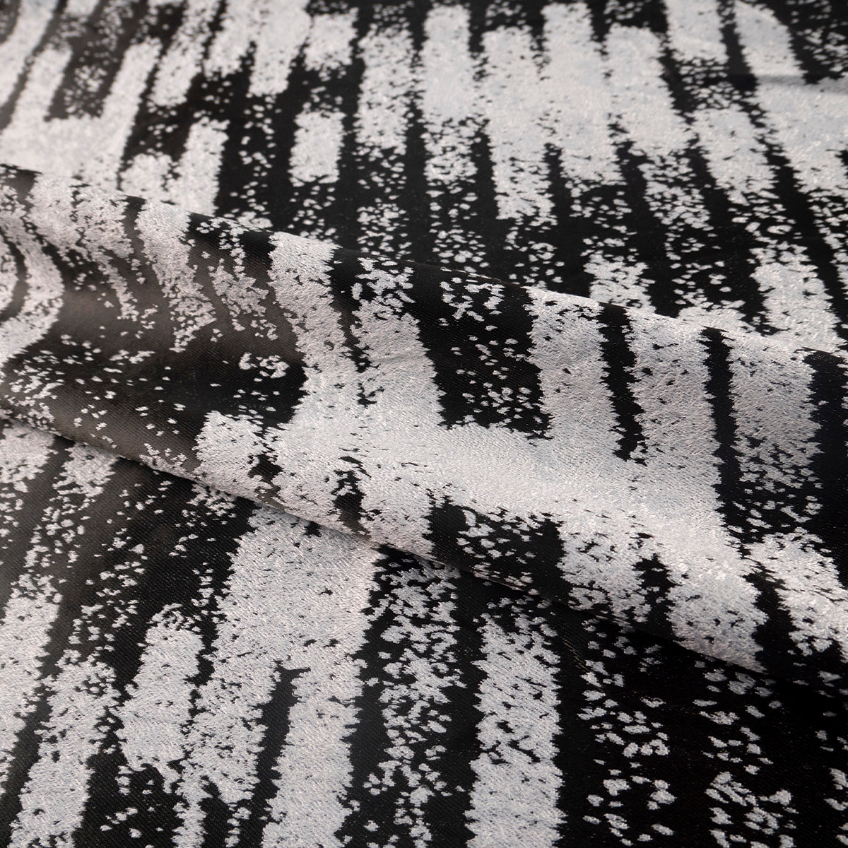 ANTISOLAR JACQUARD NEGRO METEORITO CREQUELADO