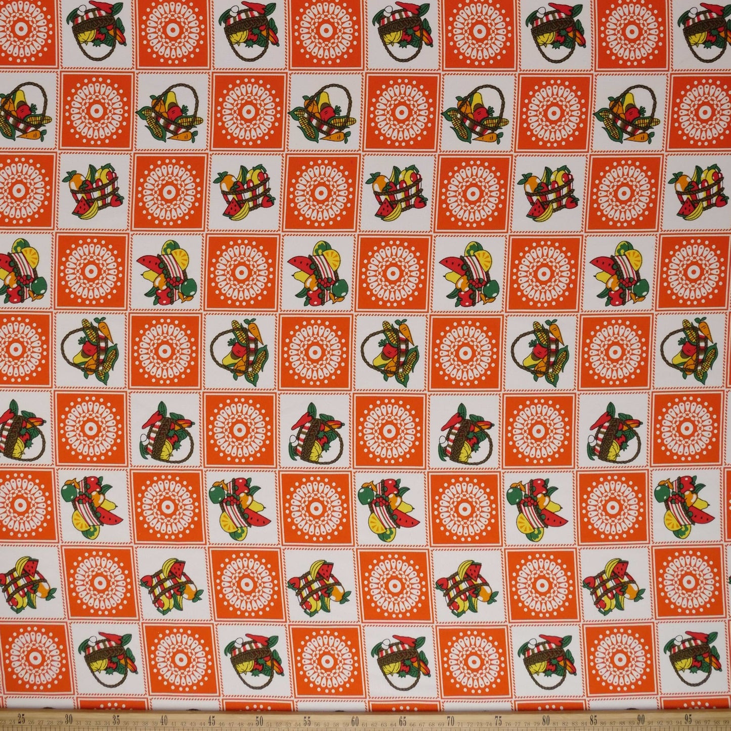 MANTELERIA ESTAMPADA NARANJA CUADRITOS CON FRUTAS