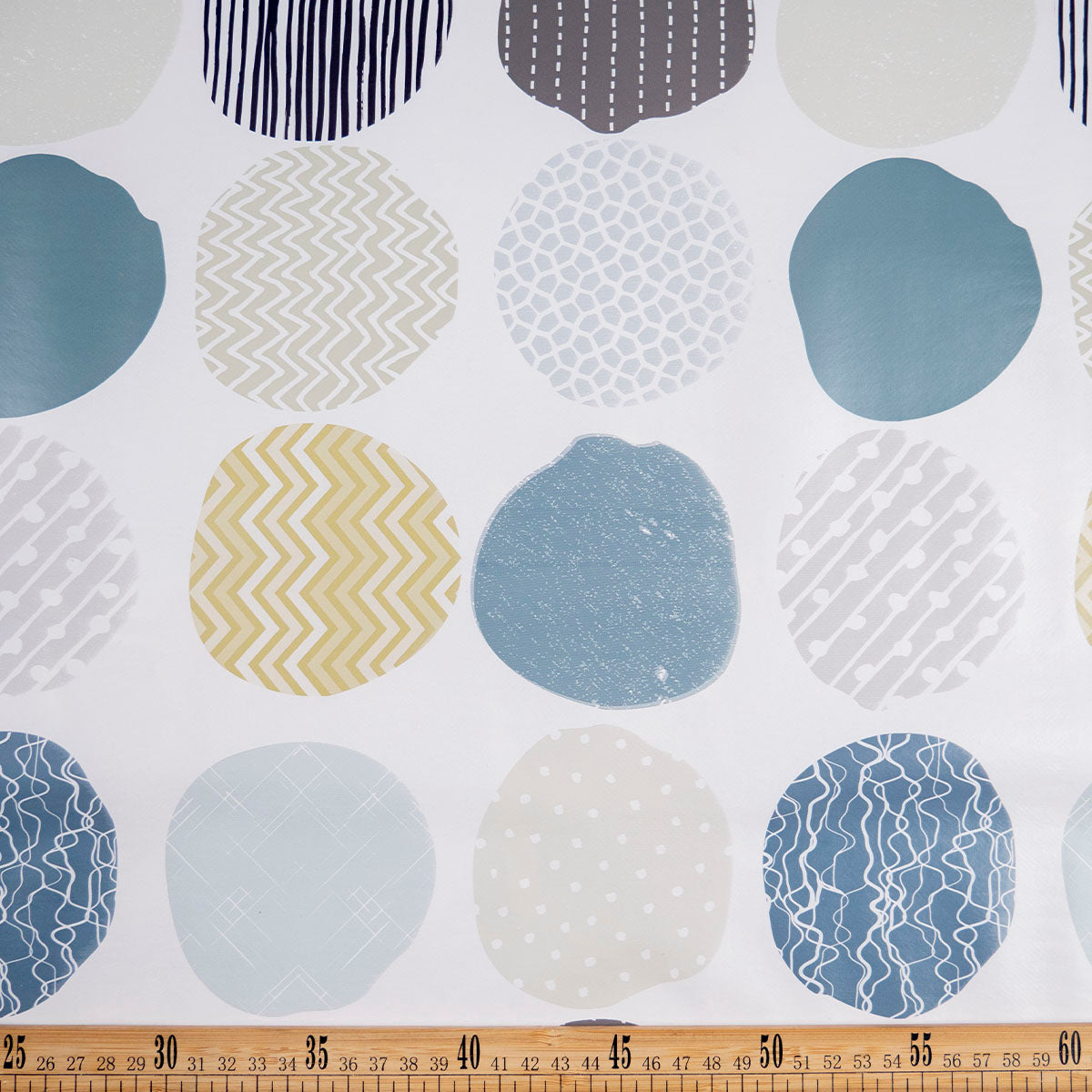 PVC DOBLE ESTAMPADO BLANCO BRILLANTE CIRCULOS CON FORMAS