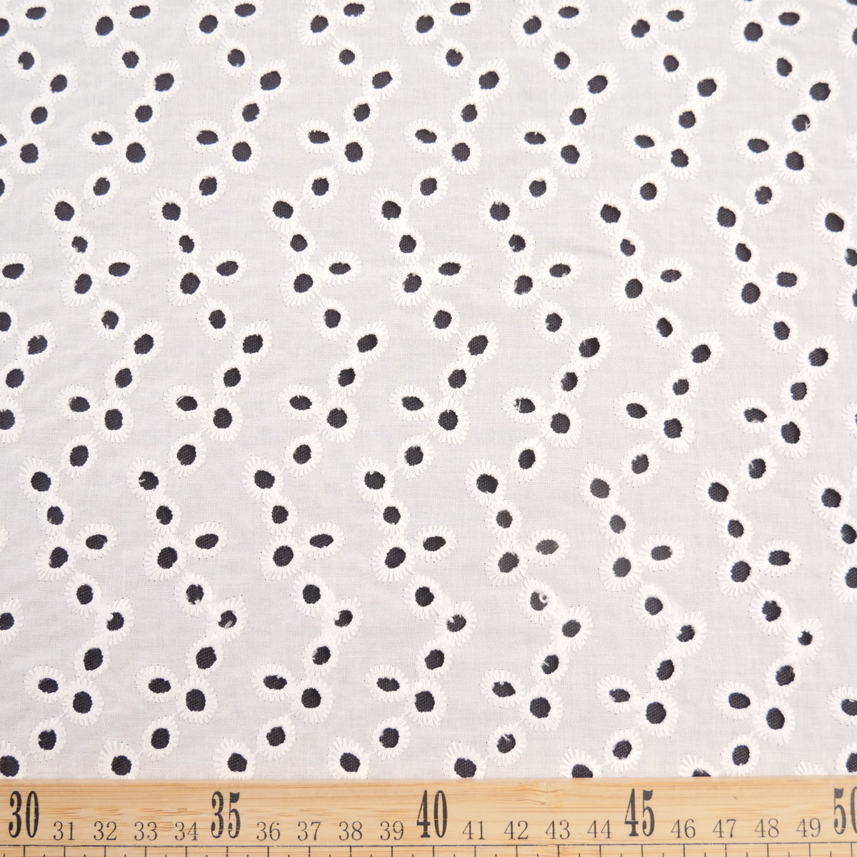 BRODERIE LOLA BLANCO BRILLANTE PUNTOS EN ONDAS