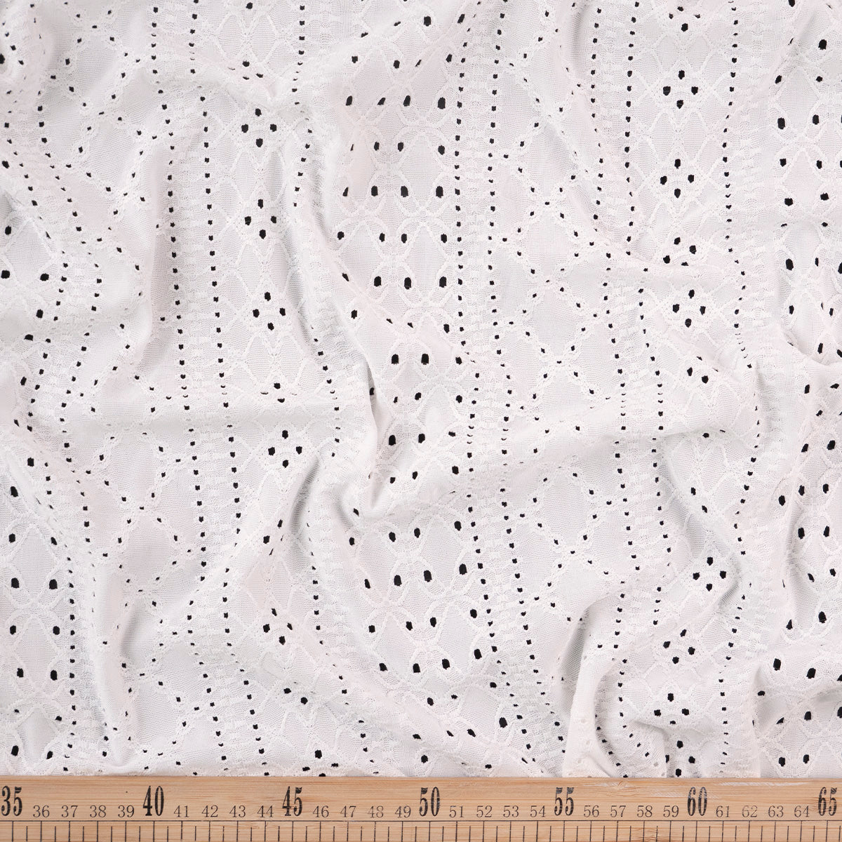 BRODERIE SPANDEX BLANCO BRILLANTE ARABESCO