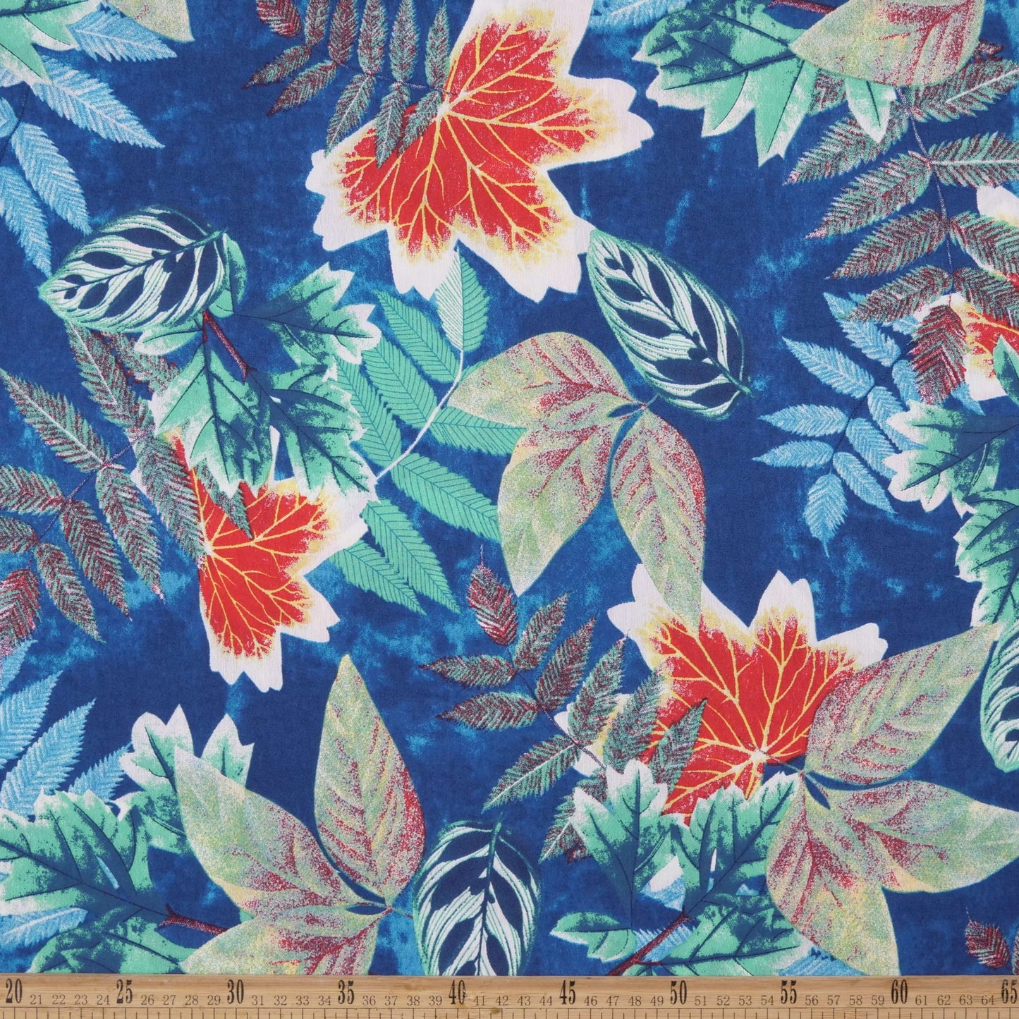 FIBRANA NYLON ESTAMPADO AZUL MAJOLICA CON HOJAS COLORIDAS