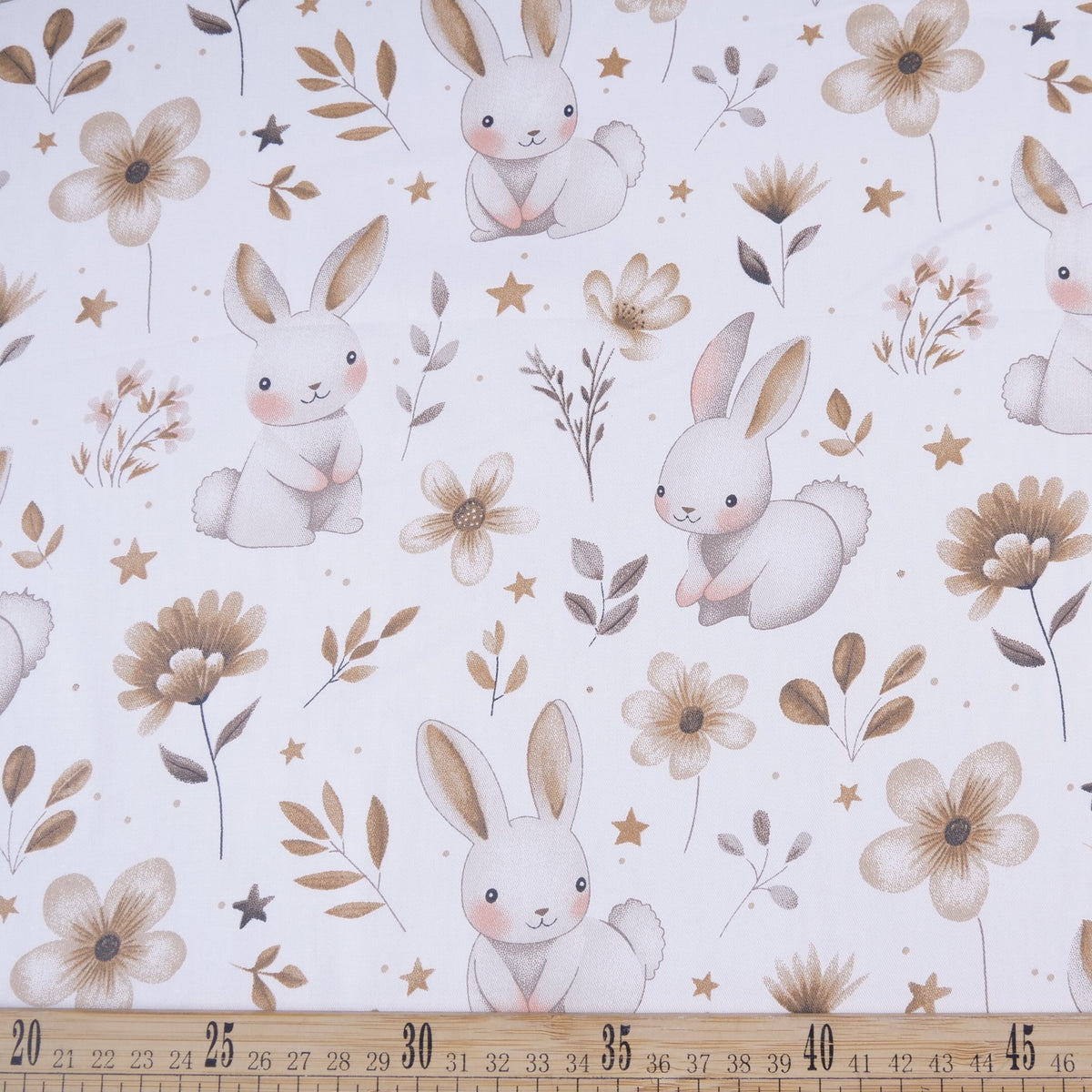 DRIL DACA ESTAMPADO BLANCO BRILLANTE JARDIN CON CONEJOS