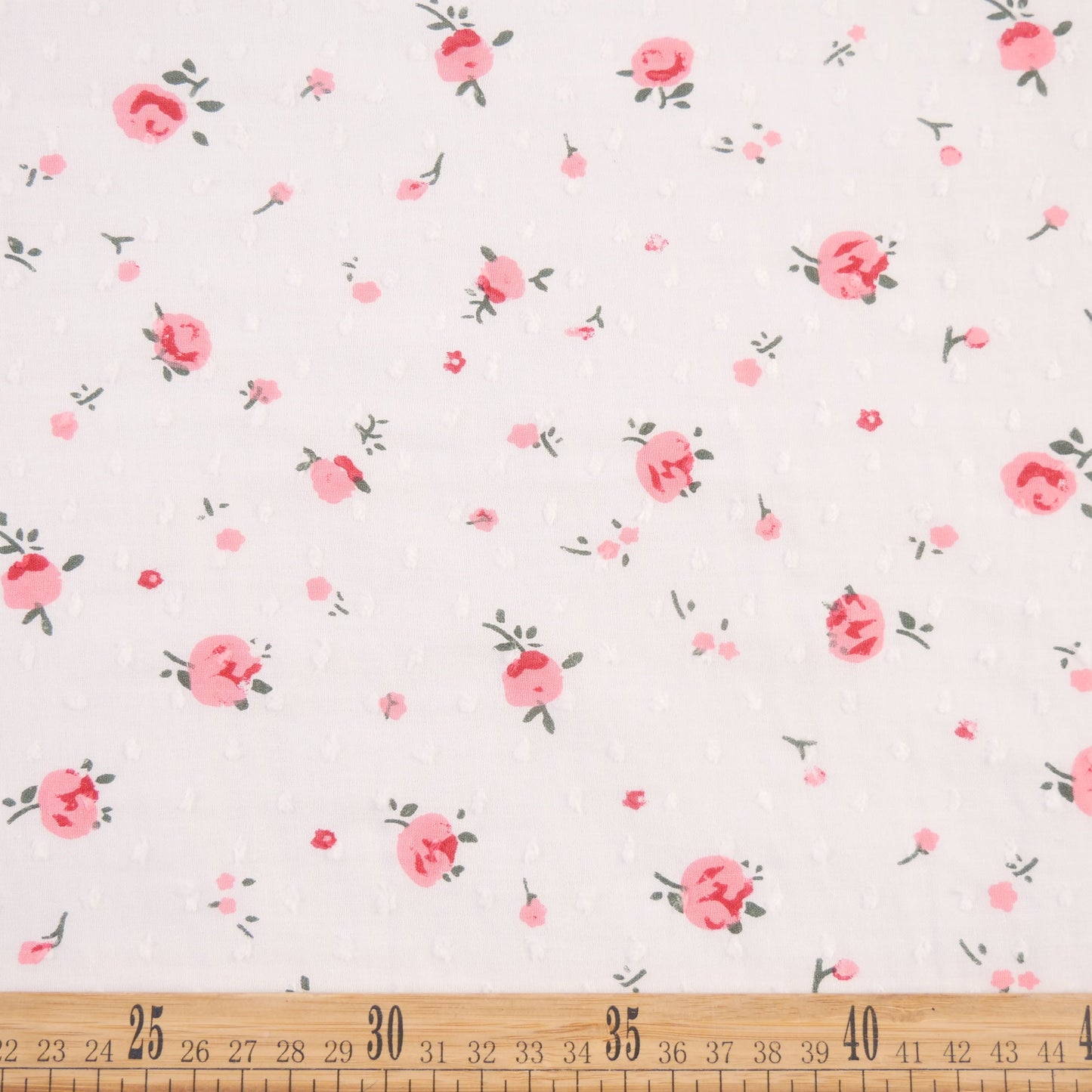 PLUMETI ESTAMPADO BLANCO BRILLANTE ROSAS