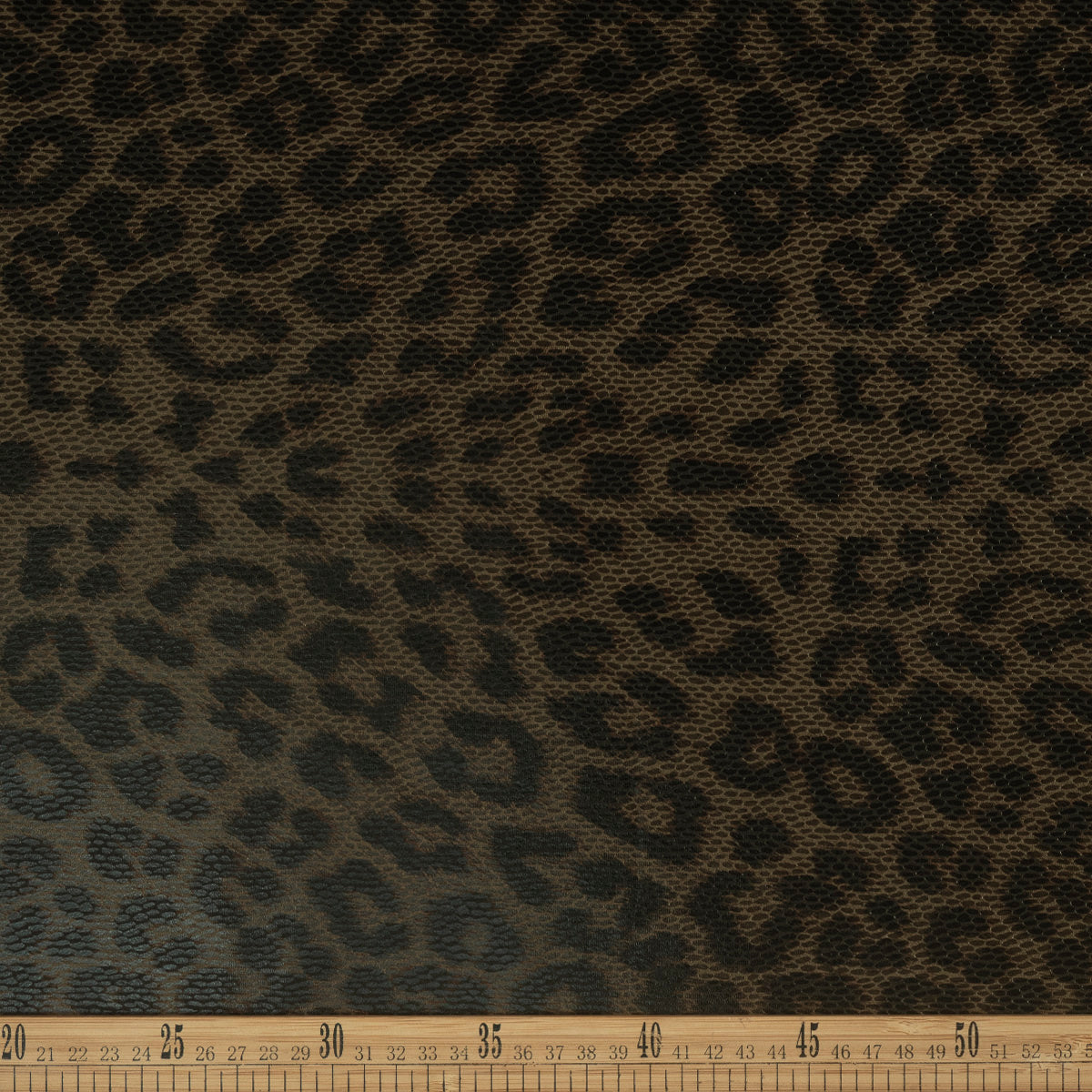 SUEDE ESTAMPADO LAMINADO MARRON AZTECA