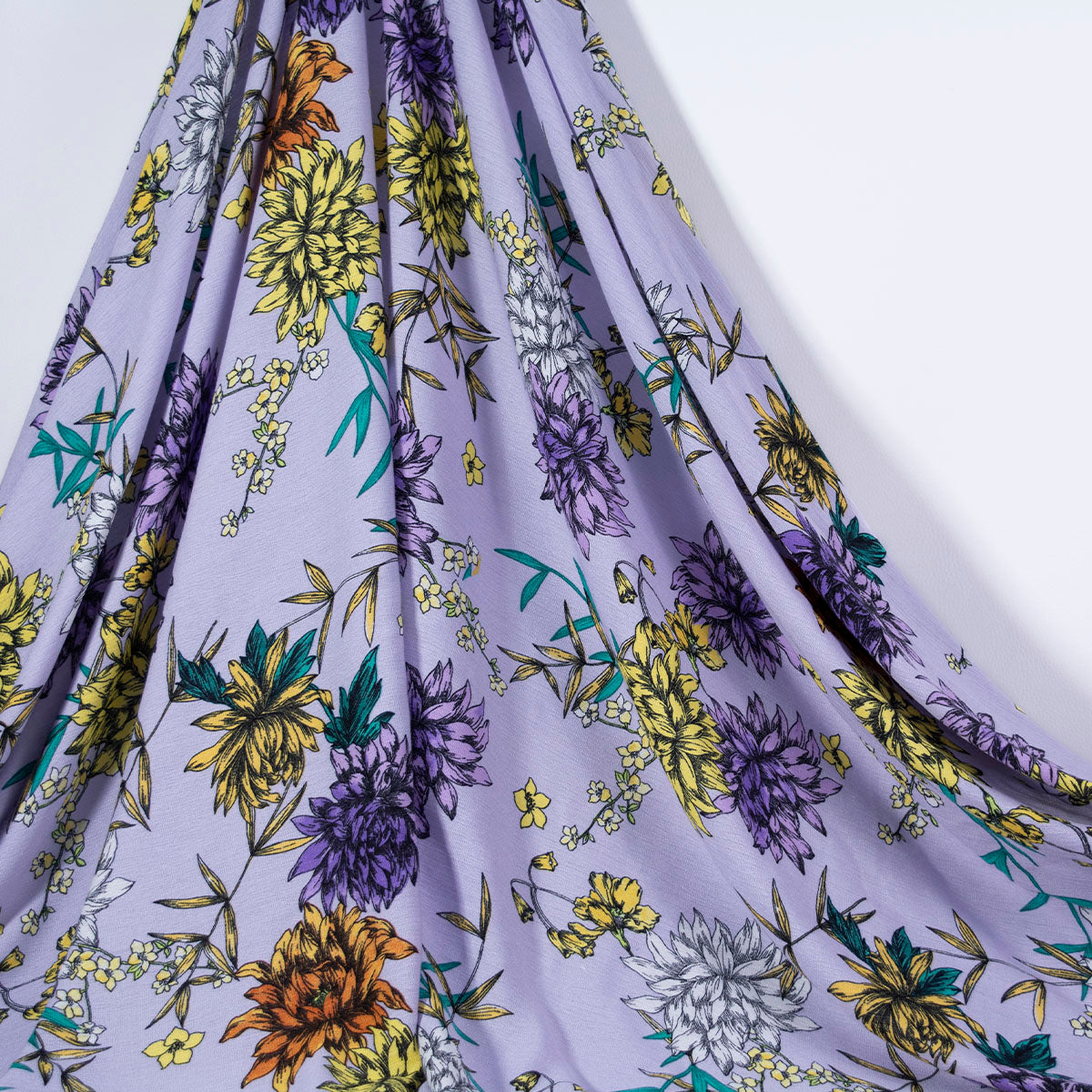 FIBRANA CREPE ESTAMPADA LILA EASTER CON FLORES COLORIDAS