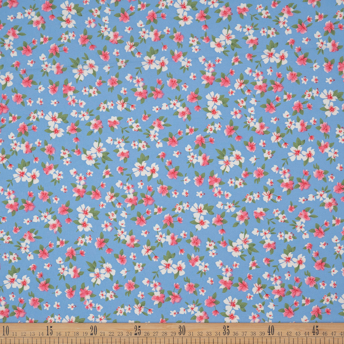 MICRO FOURWAY ESTAMPADO AZUL ULTRAMARINO CON FLORES PEQUEÑAS ROJAS Y BLANCAS