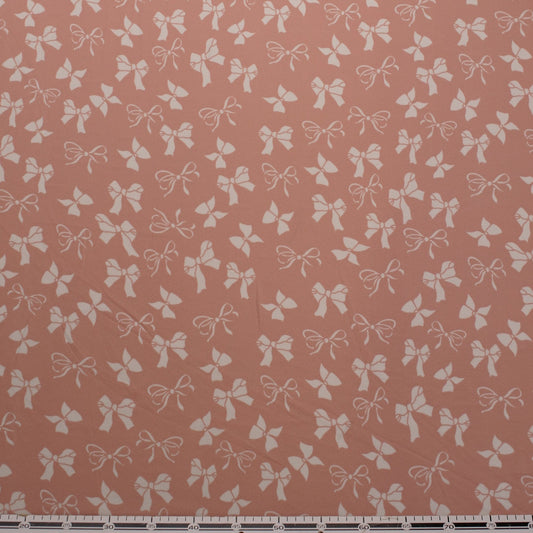 CREPE BOUCLE ESTAMPADO ROSA APRICOT MOÑOS