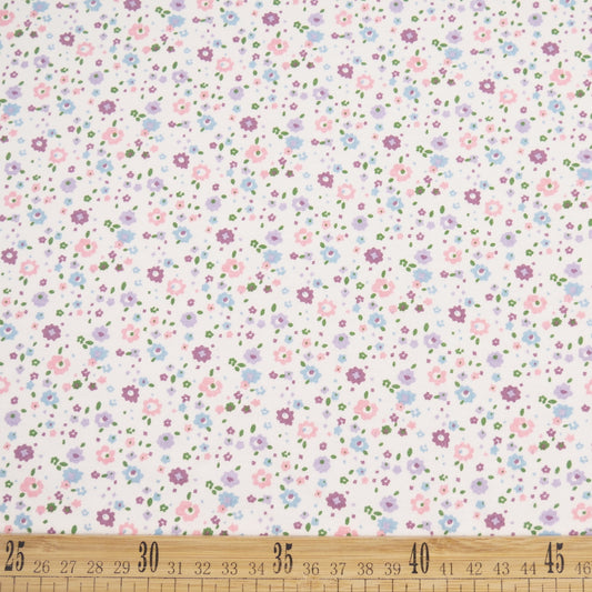 INTERLOCK COTTON INFANTIL BLANCO BRILLANTE CON PEQUEÑAS FLORES