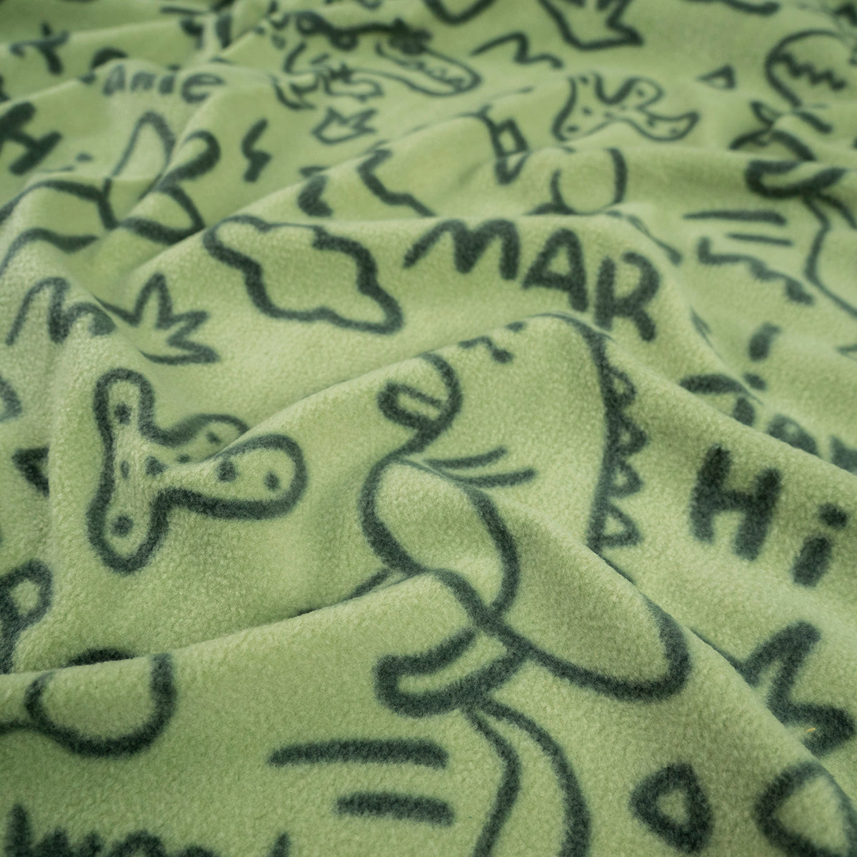 MOLETON FRISA ESTAMPADO VERDE SECO DINOS