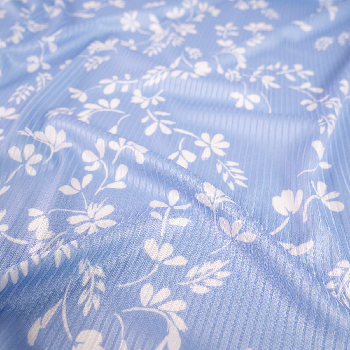 MORLEY ESTAMPADO CELESTE CIELOCON HOJAS BLANCAS