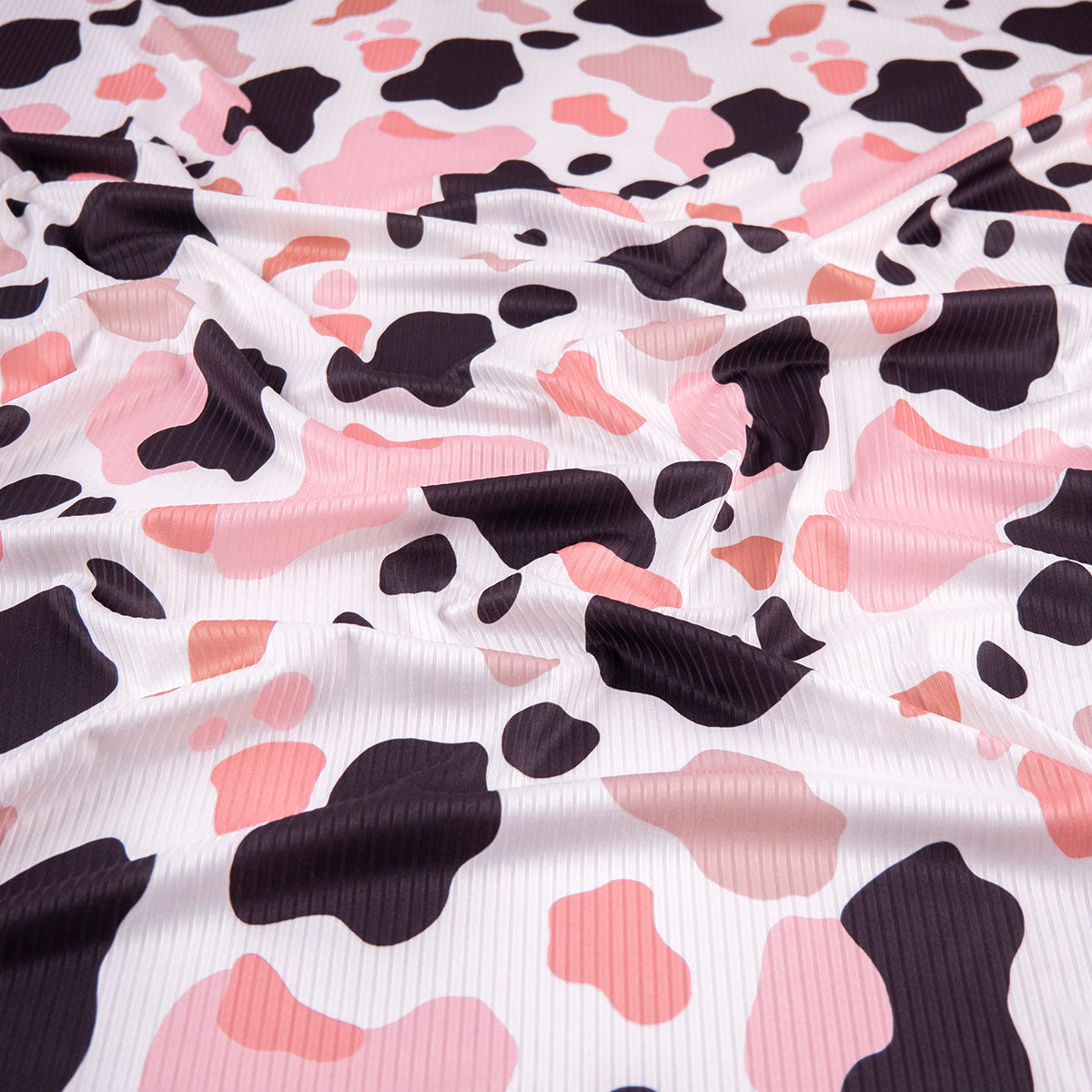 MORLEY ESTAMPADO BLANCO BRILLANTE MANCHAS DE VACAS COLORIDAS