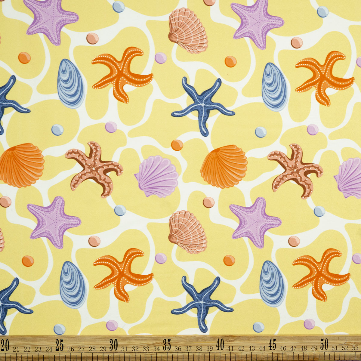 MICROFIBRA SPANDEX ESTAMPADO AMARILLO CERA FONDO MARINO