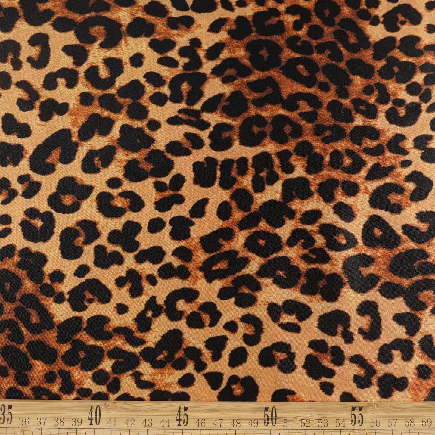 SATEN ESTAMPADO NARANJA DORADO ANIMAL PRINT