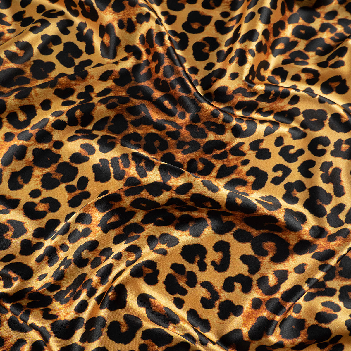 SATEN ESTAMPADO NARANJA DORADO ANIMAL PRINT