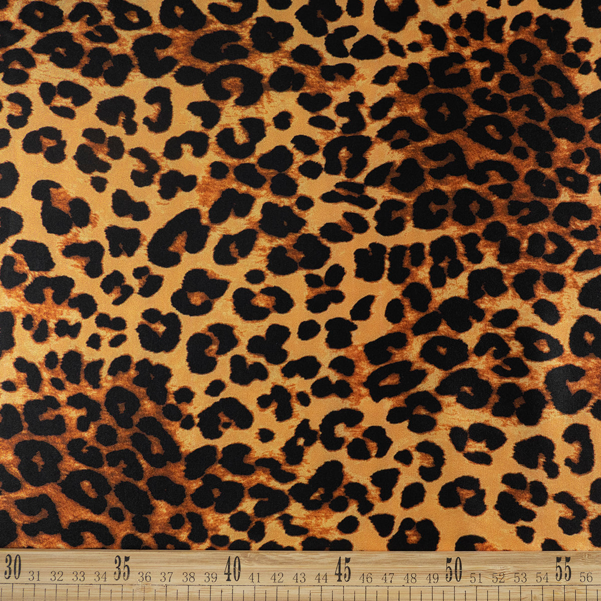SATEN ESTAMPADO NARANJA DORADO ANIMAL PRINT