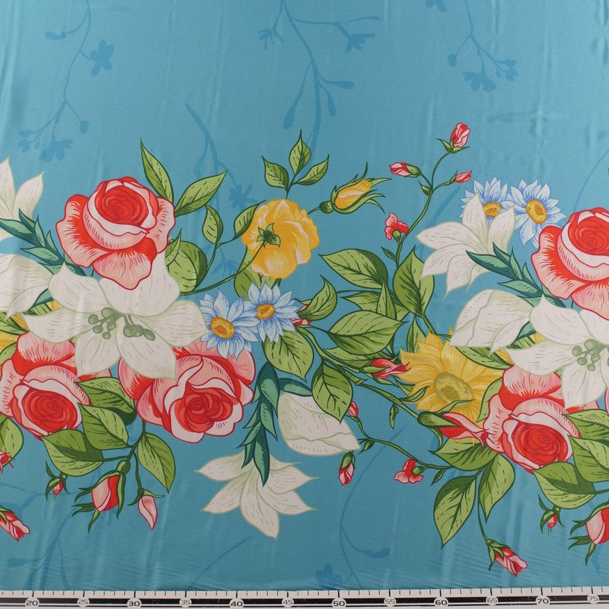 SATEN ESTAMPADO AGUAMARINA CON GUARDAS FLORAL