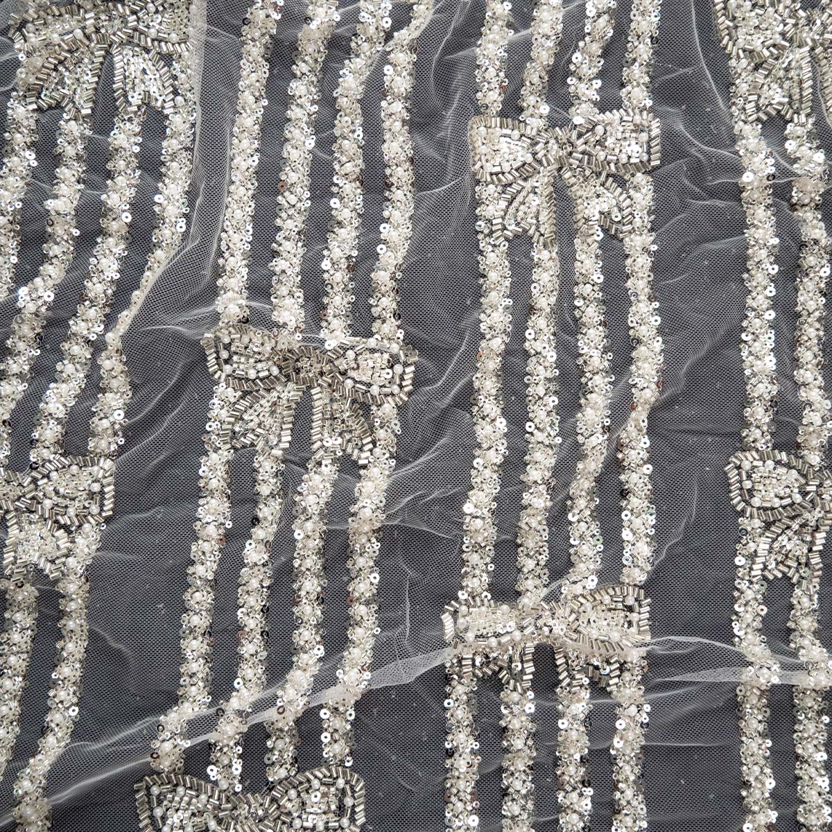 TUL PRADA BLANCO BRILLANTE RAYAS Y MOÑOS