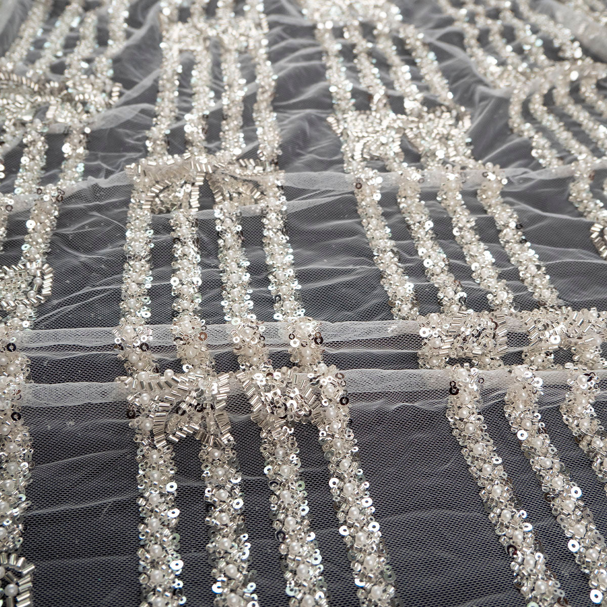 TUL PRADA BLANCO BRILLANTE RAYAS Y MOÑOS