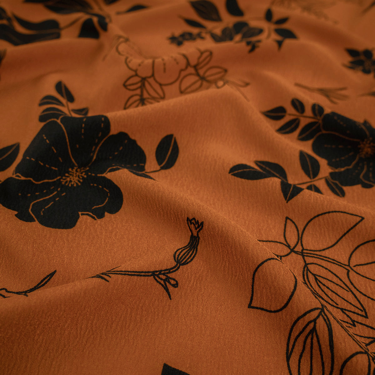 CREPE CEY ESTAMPADO MARRON CUERO FLORAL