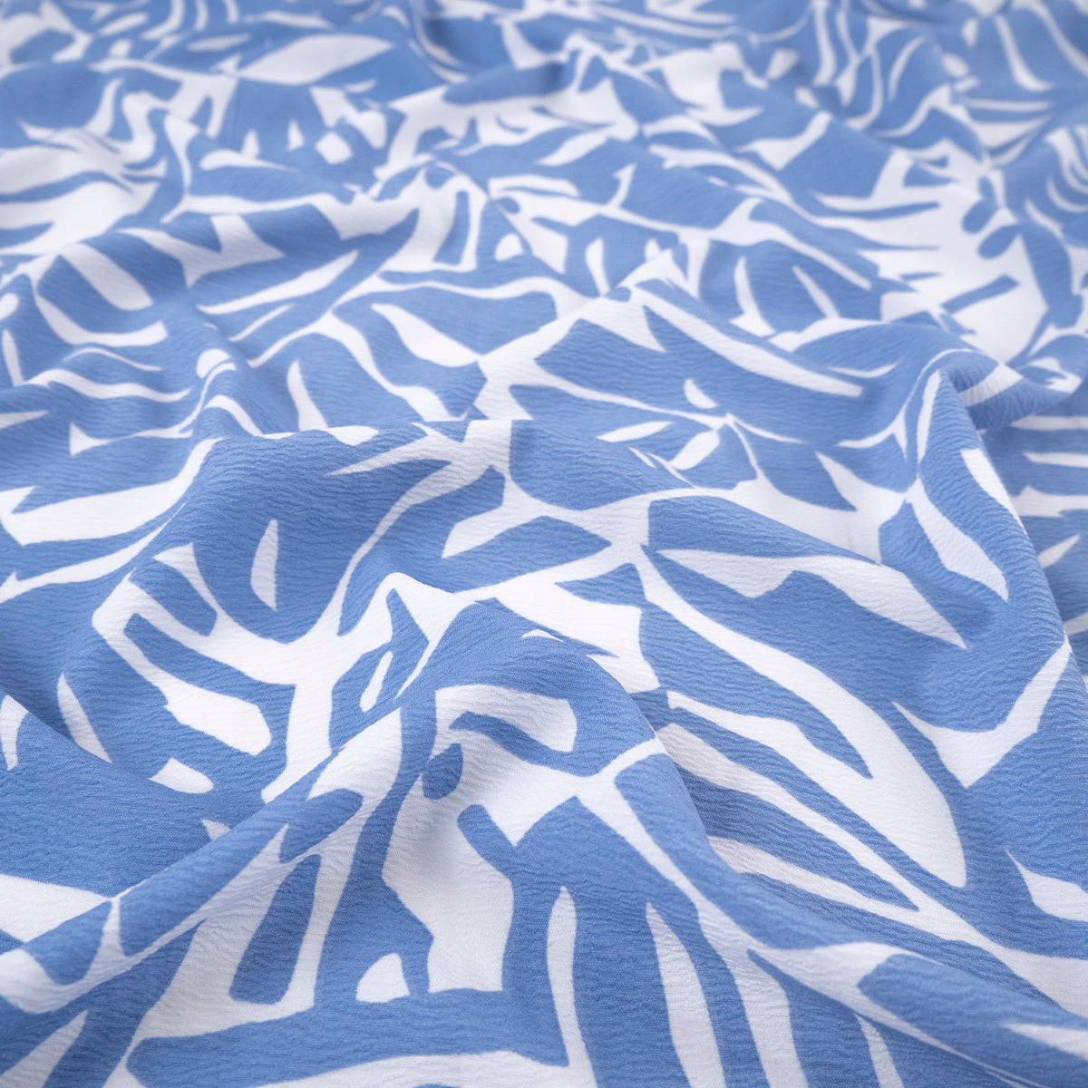 CREPE CEY ESTAMPADO AZUL BELL BOTANICAS CON HOJAS