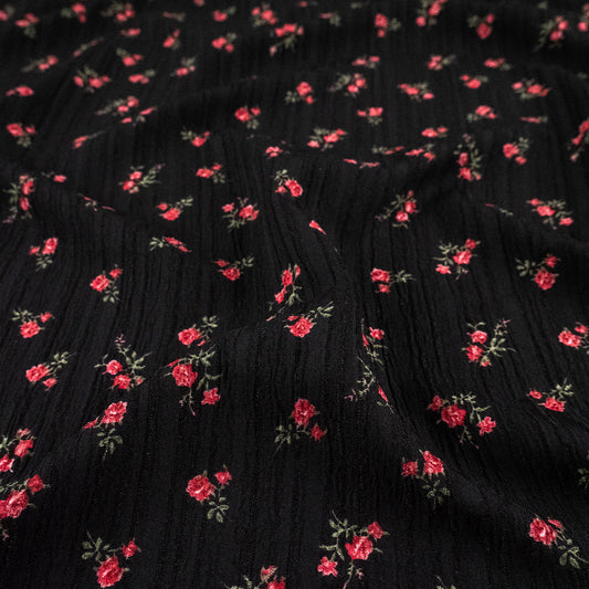 CREPE MARINA ESTAMPADO NEGRO METEORITO FLORAL ROJO