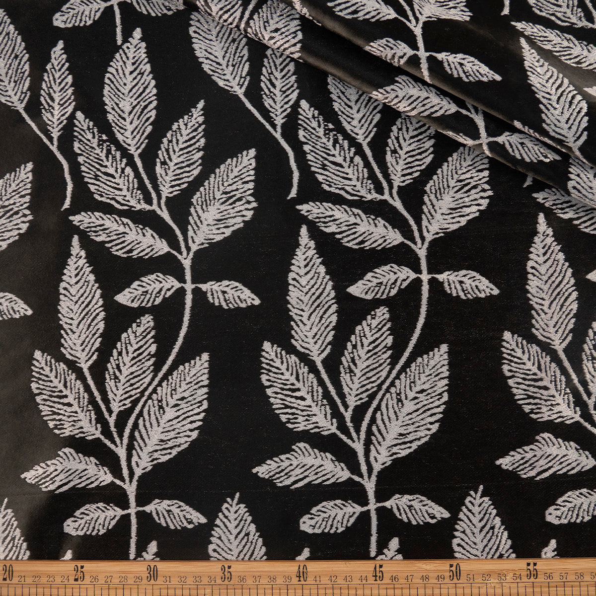 ANTISOLAR JACQUARD NEGRO METEORITO HOJAS