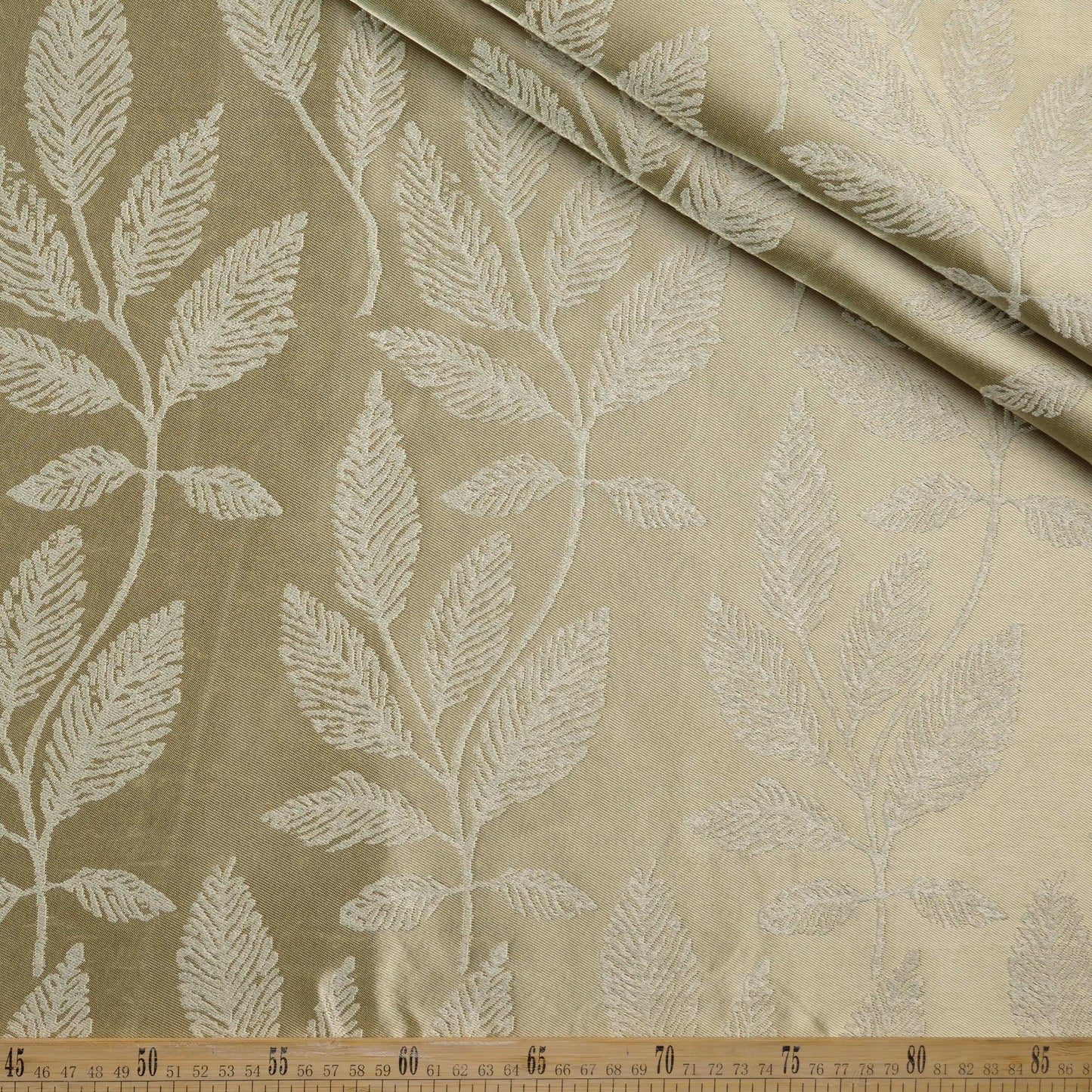 ANTISOLAR JACQUARD NATURAL PELICANO HOJAS