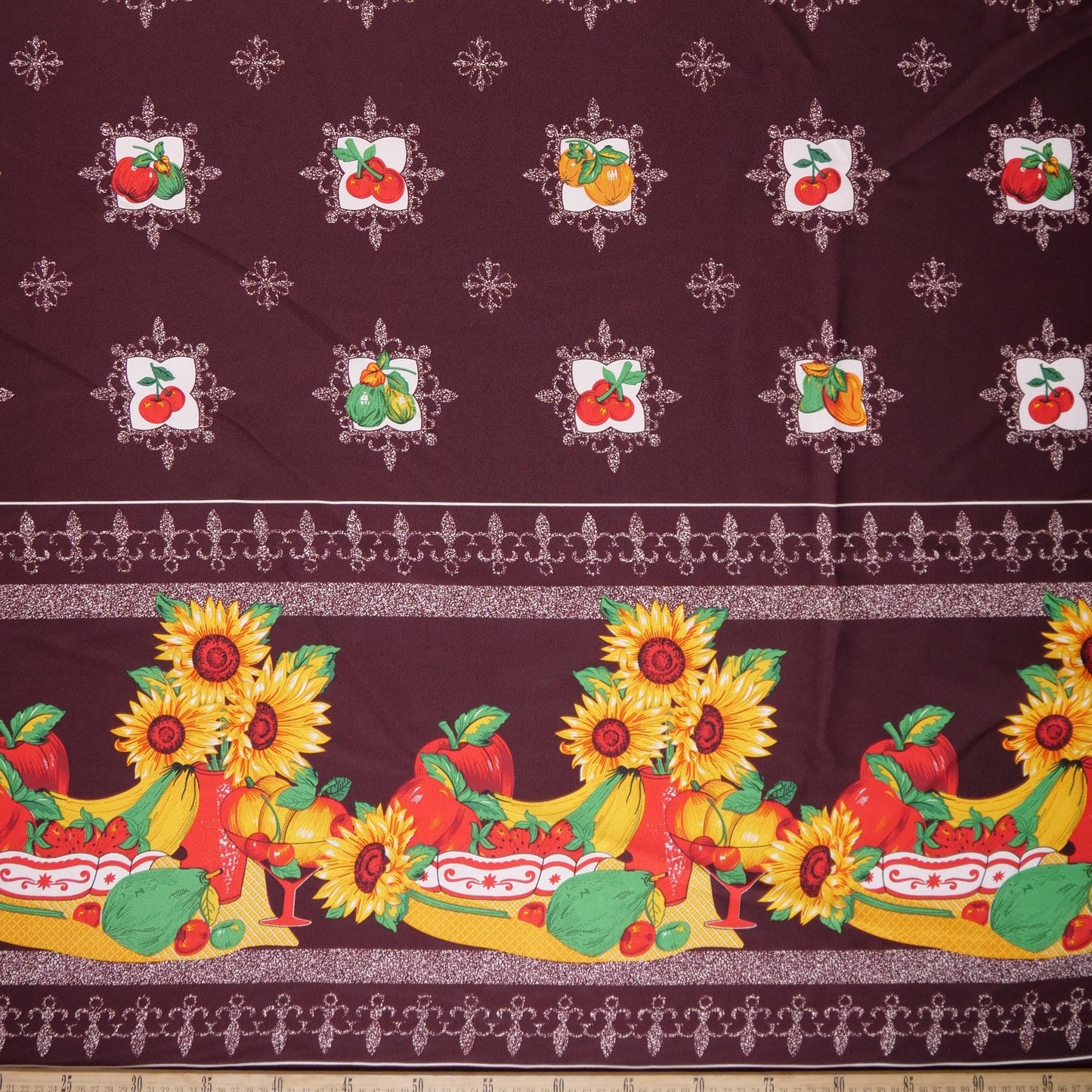 MANTELERIA ESTAMPADO MARRON CARIBOU FRUTAS Y GIRASOLES