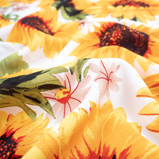 MANTELERIA ESTAMPADA BLANCO BRILLANTE CON GIRASOLES