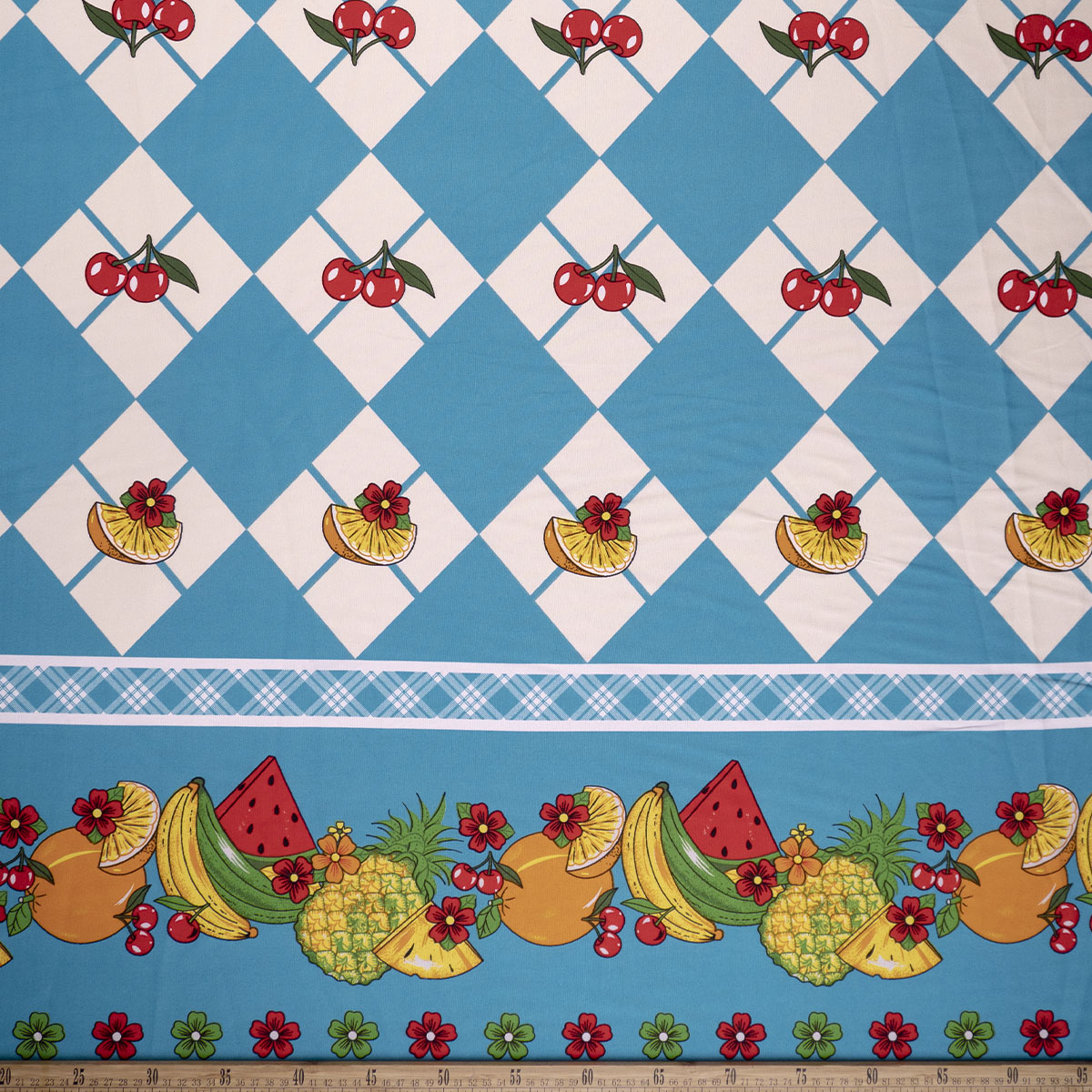 MANTELERIA ESTAMPADA TURQUESA CYAN CON FRUTAS