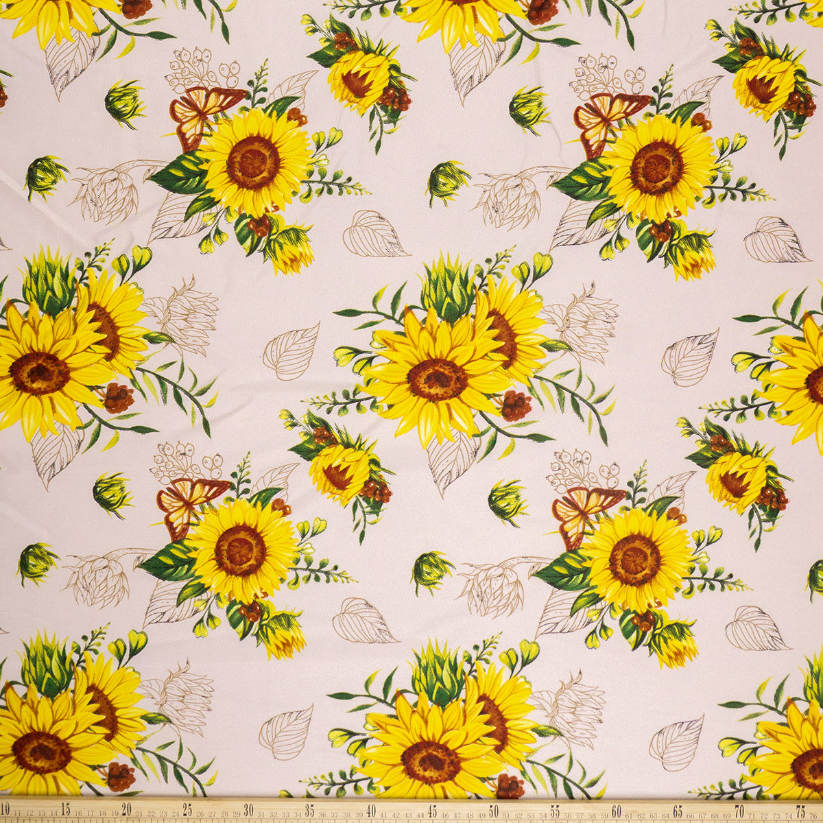 MANTELERIA ESTAMPADO VAINILLA GIRASOLES Y HOJAS MARRONES