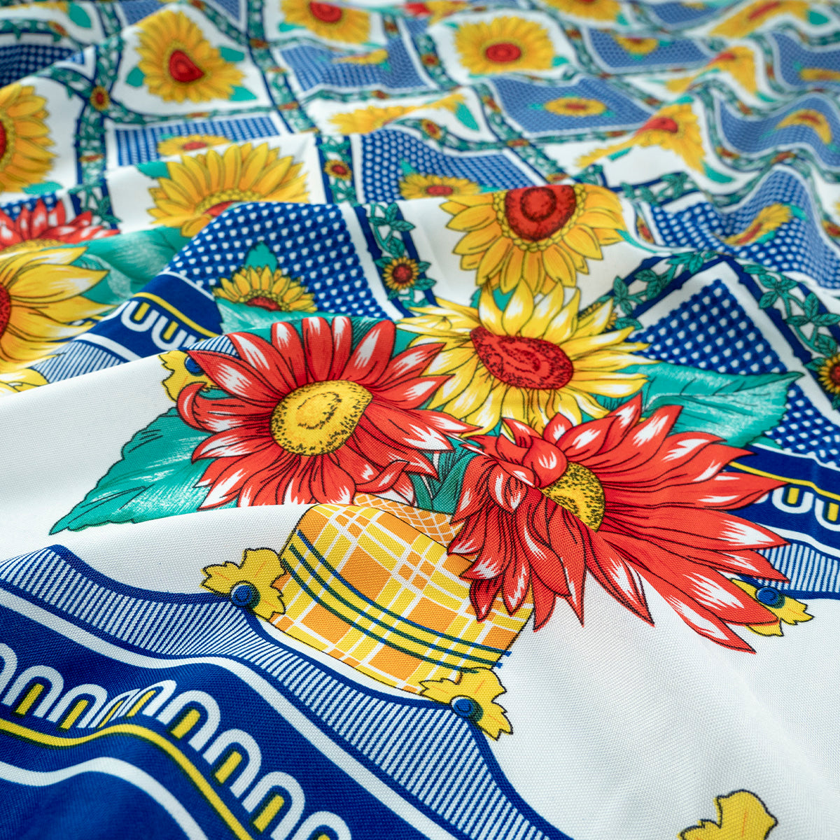 MANTELERIA ESTAMPADA AZUL SURF GUARDAS CON GIRASOLES