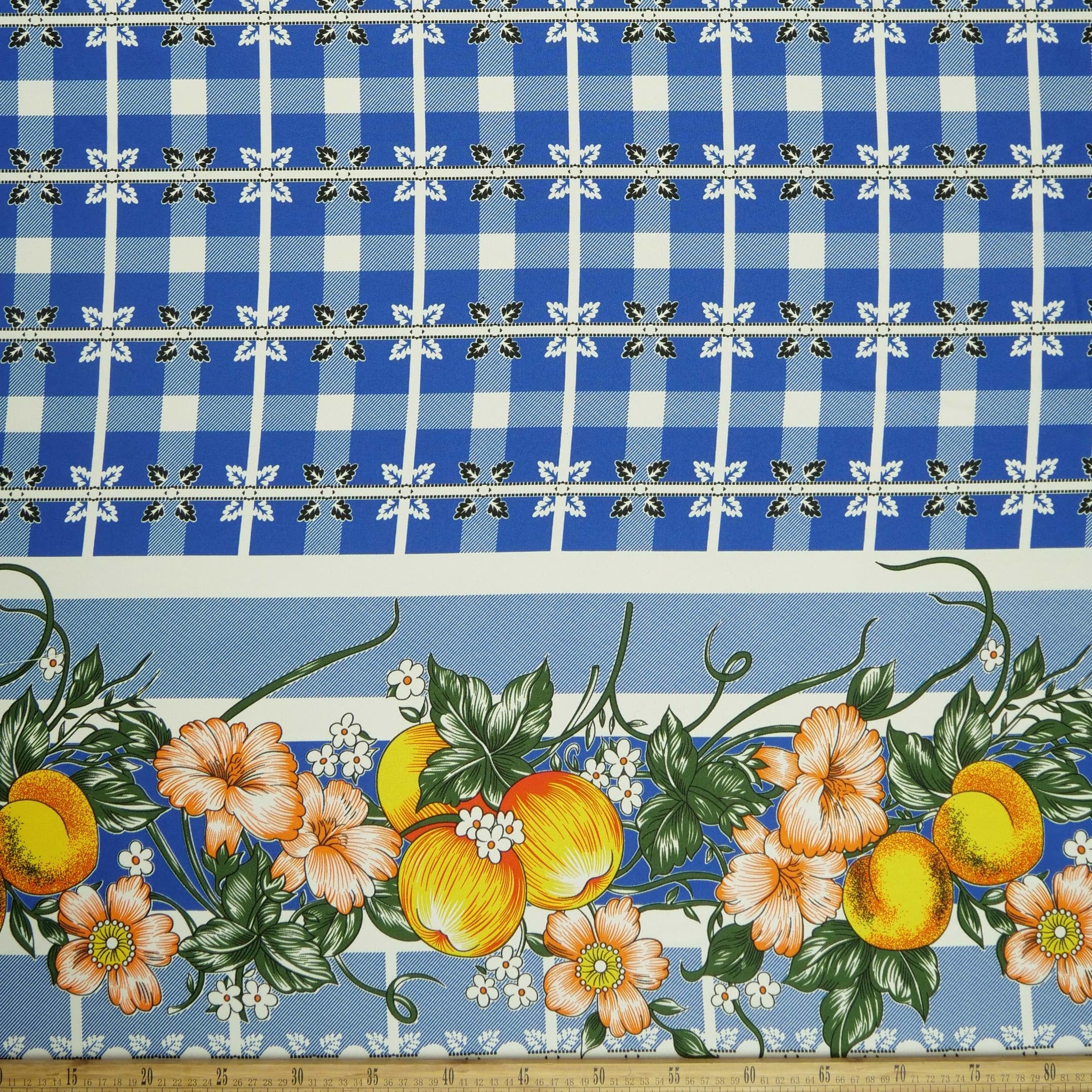 MANTELERIA ESTAMPADO AZUL SURF A CUADROS CON GUARDAS FRUTALES