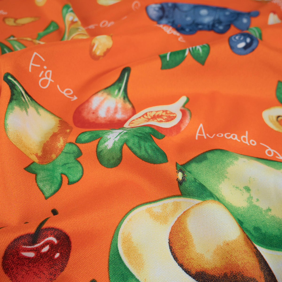 MANTELERIA ESTAMPADA NARANJA EXUBERANTE CON AGUACATES