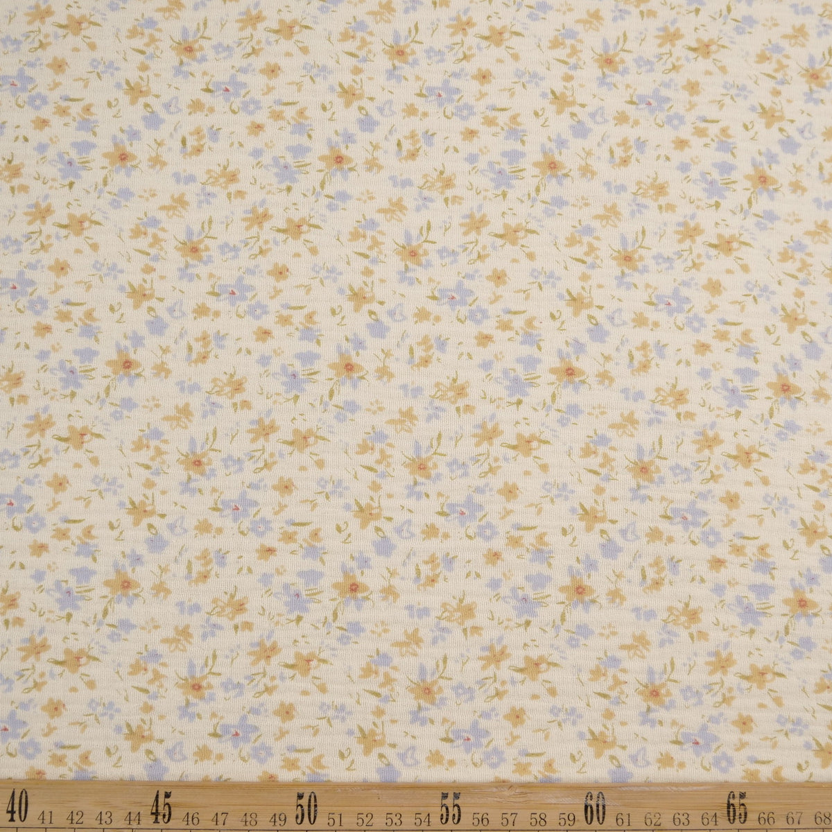 BABY COTTON INFANTIL AMARILLO CERA FLORAL AZUL Y BEIGE