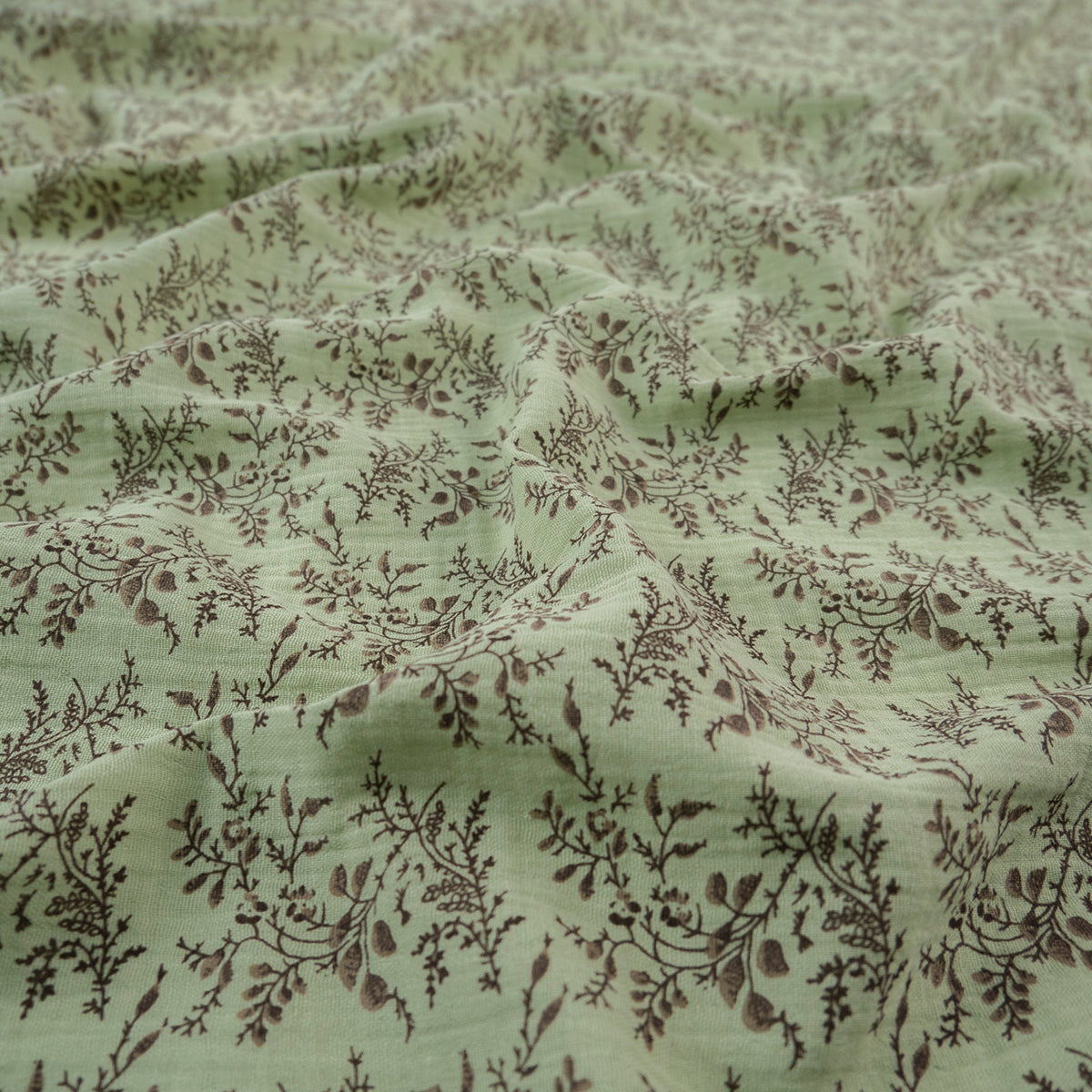 BABY COTTON INFANTIL VERDE ZARCILLO CON RAMAS NEGRAS Y HOJAS VERDES