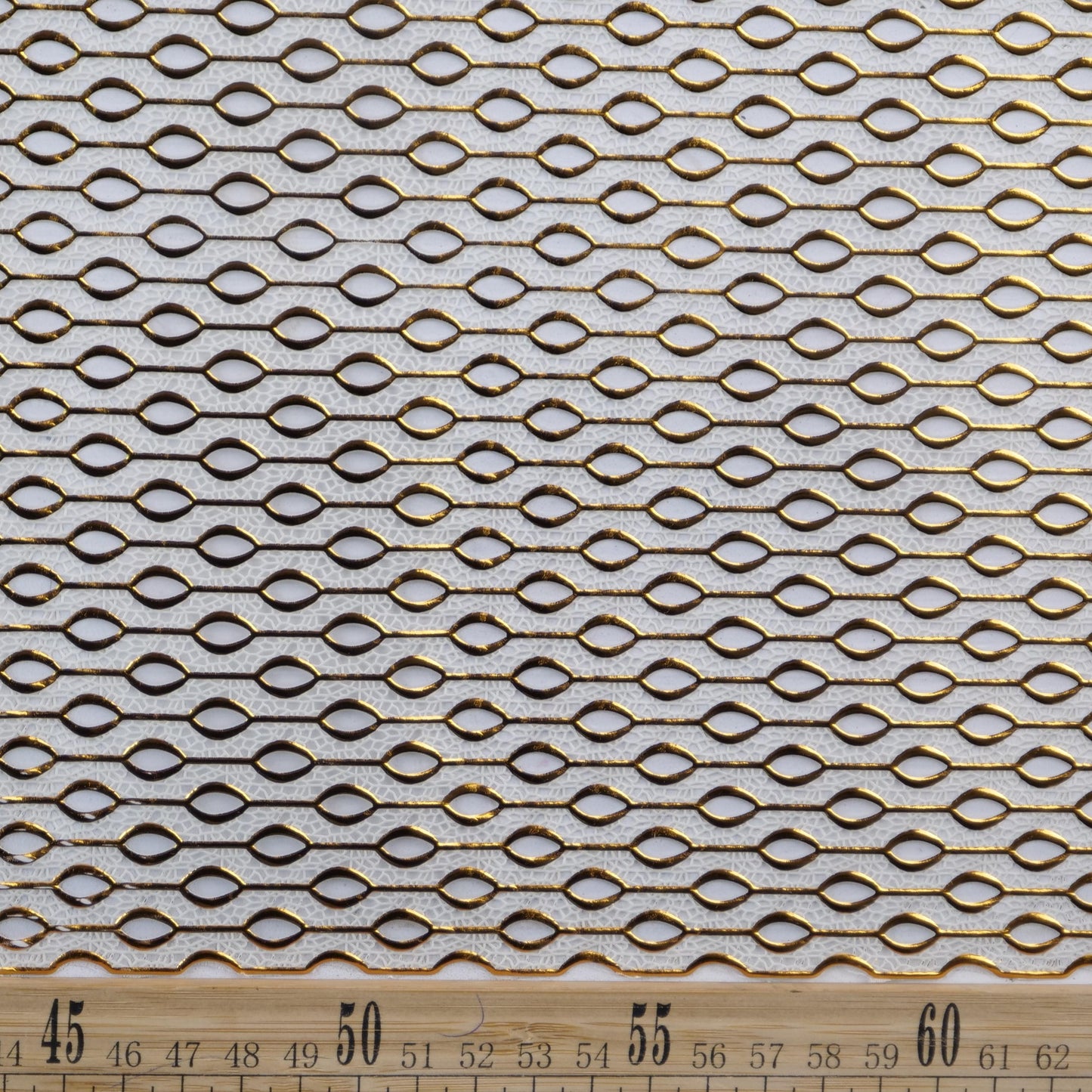 PVC DORADO CAMEL CARAMELO GEOMETRICO