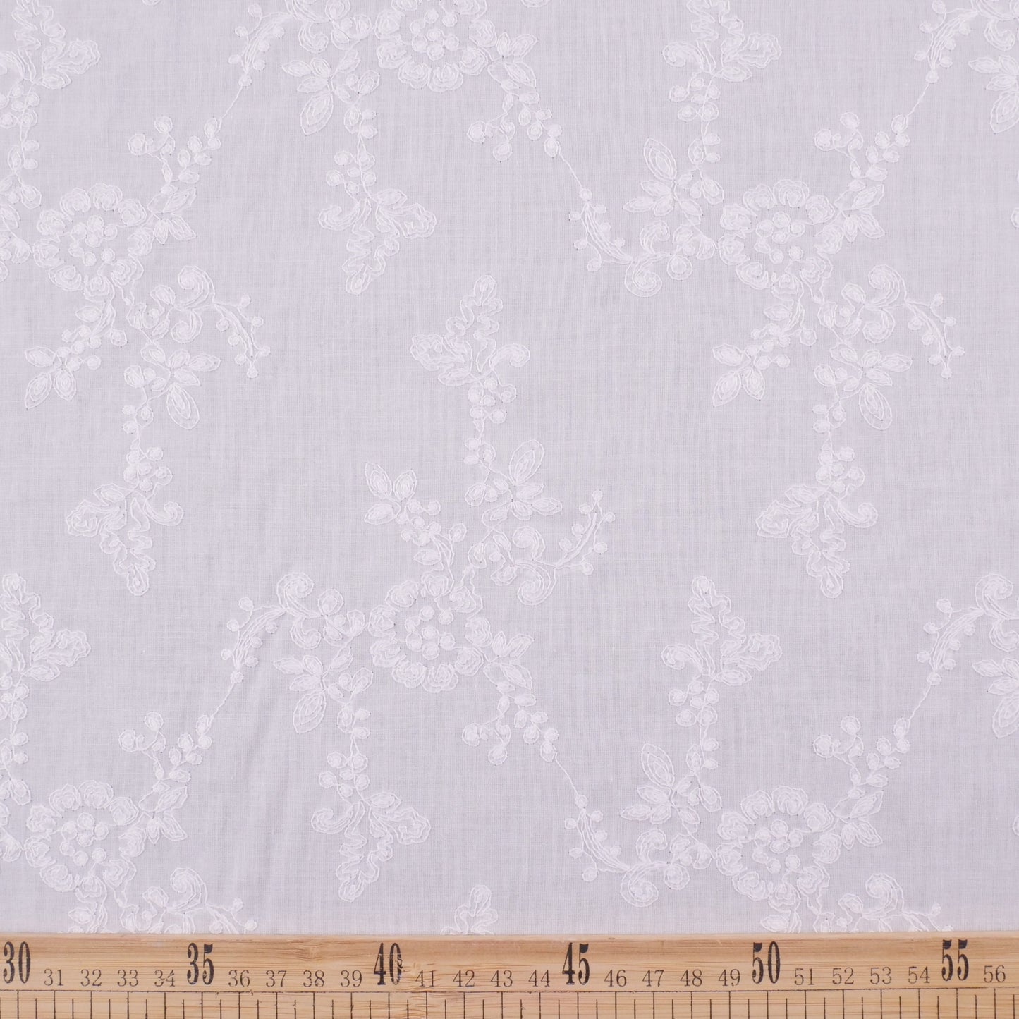 BRODERIE LOLA BLANCO BRILLANTE CON FLORES Y HOJAS