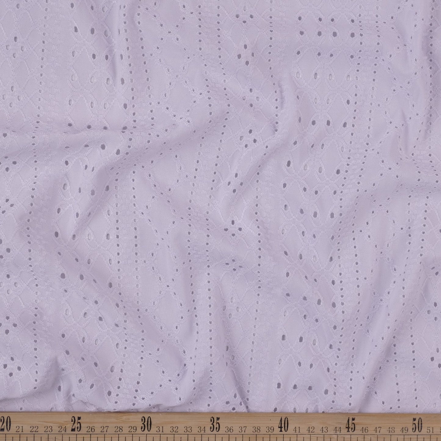 BRODERIE SPANDEX BLANCO AZULADO