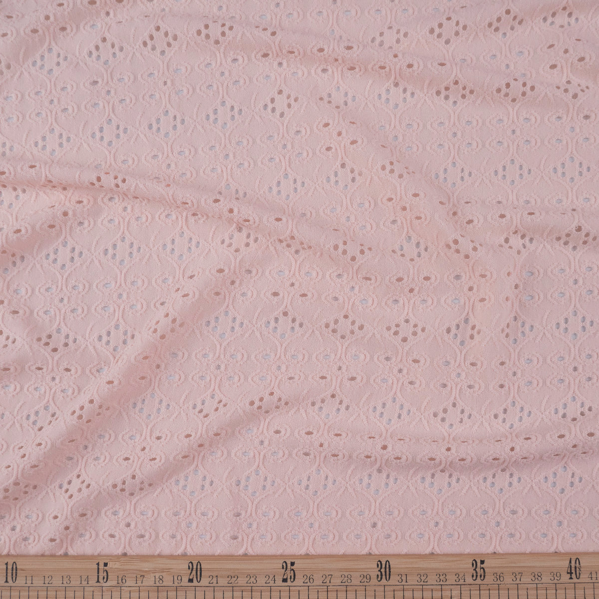 BRODERIE SPANDEX ROSA DURAZNO ARABESCO